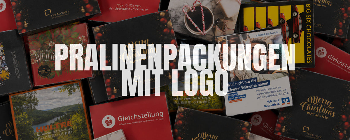 Vielfalt bedruckter Pralinenpackungen mit Firmenlogos von Hessen Schokolade