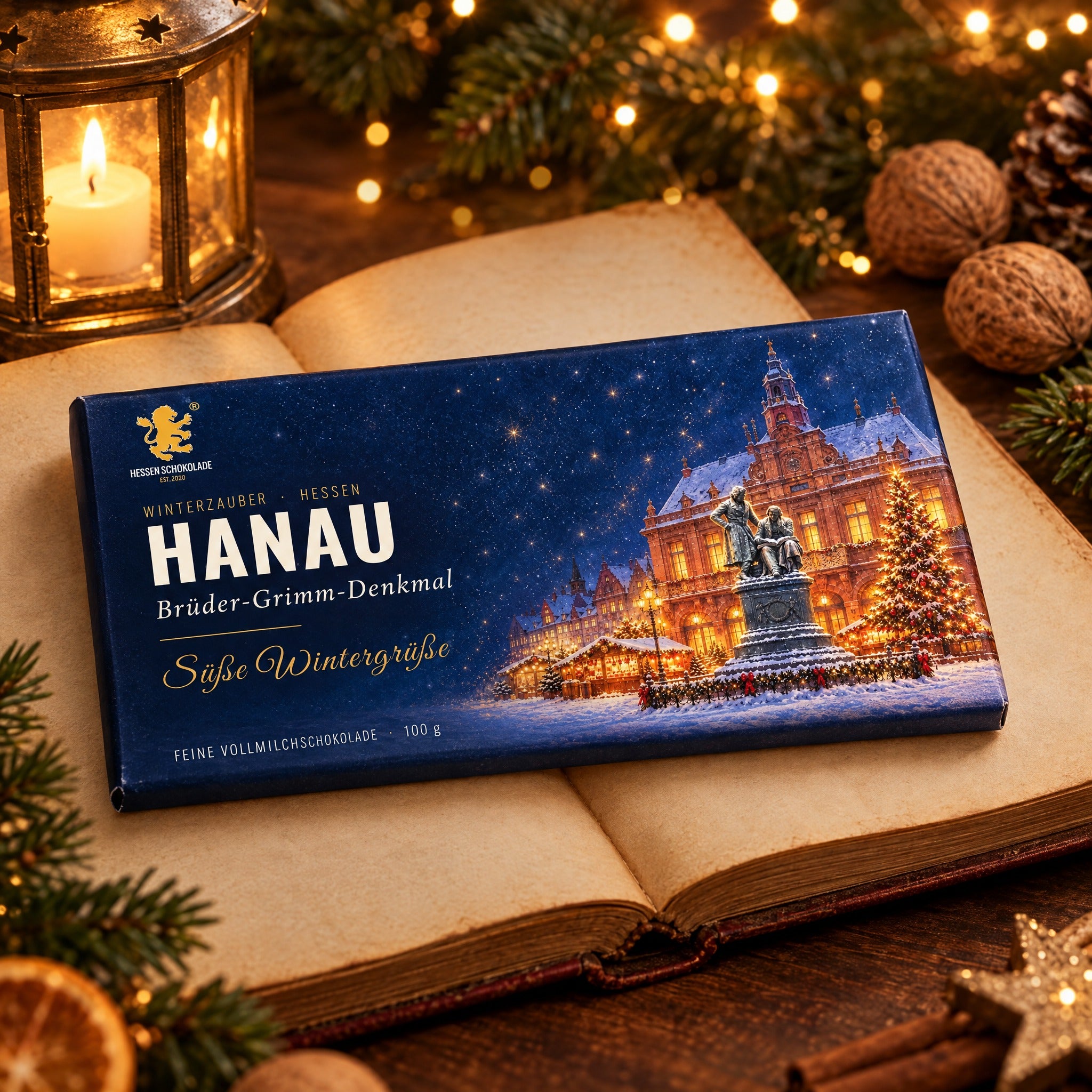 Weihnachtsschokolade Hanau: Vollmilch-Tafel „Brüder-Grimm-Denkmal“ auf altem Märchenbuch – Winterzauber Hessen